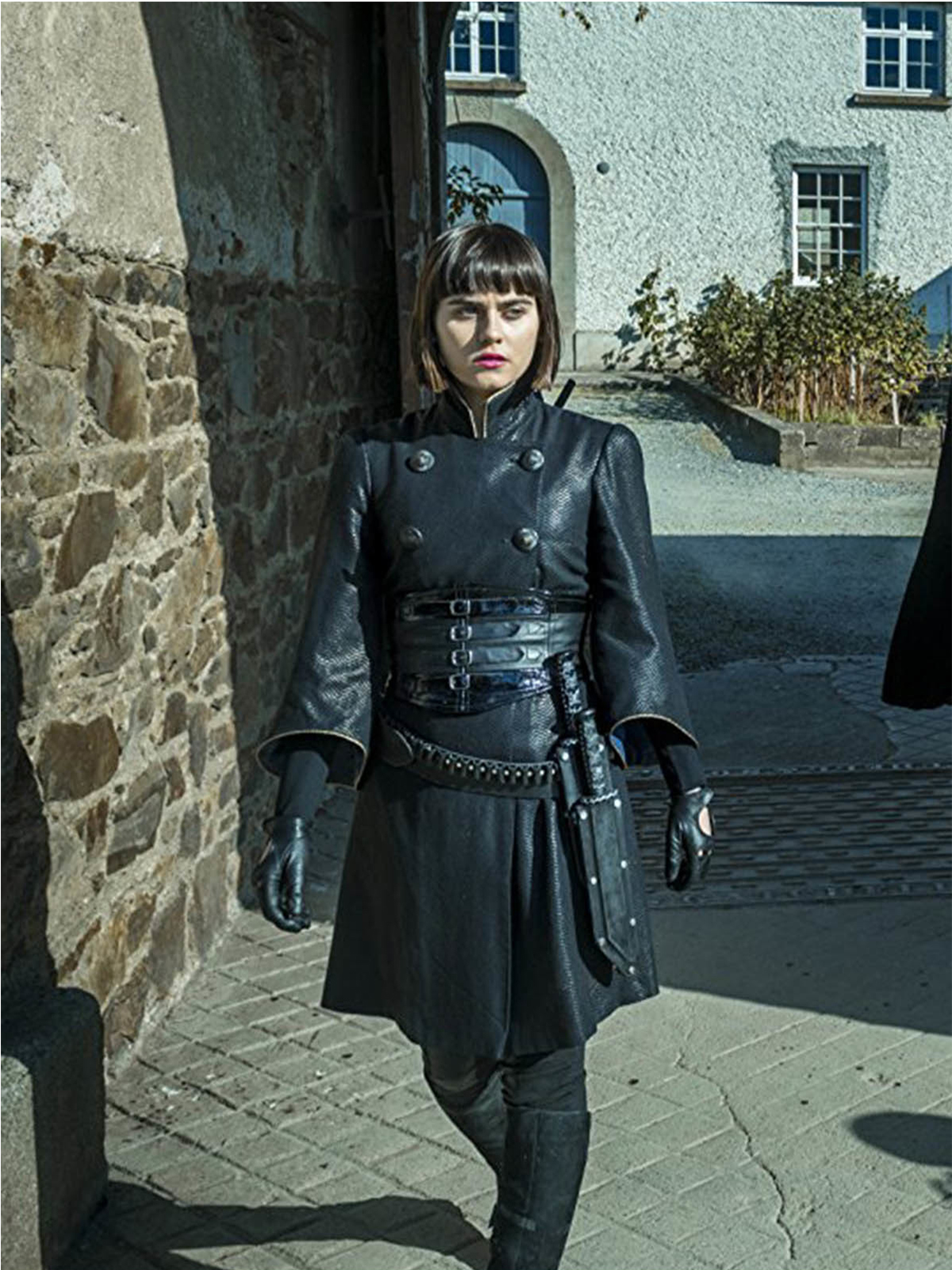 Tilda Ally Ioannides Black Coat in The Badlands